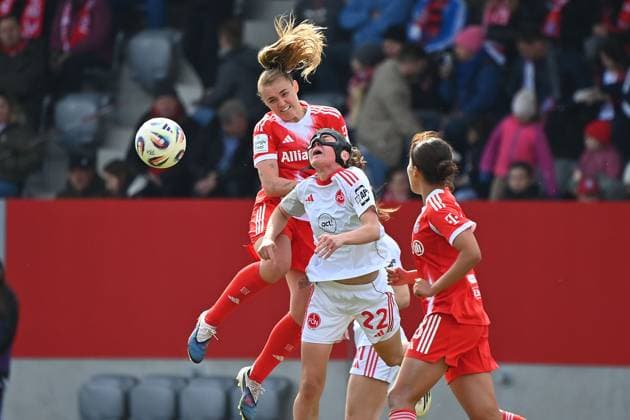 from left Georgia STANWAY FCB , Julia POLLAK N action,duel against football Google Pixel Bundesliga women season 2025 2026, 22 matchday, matchday22 FC Bayern Muenchen Women 1 FC Nuernberg on 28 03 2026 FC BAYERN CAMPUS