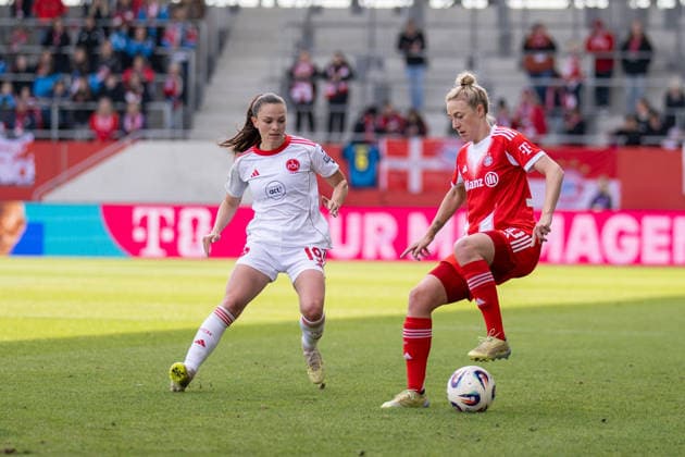 Selma Licina 17 1 FC Nuernberg in duel with Carolin Simon 30 FC Bayern Muenchen , FC Bayern Frauen Muenchen 1 FC Nuernberg, Google Pixel Frauenbundesliga, 22 Spieltag, 28 03 26 DFB regulations prohibit any use of photographs as image sequences and or quasi video kolbert press Muenchen Bayern Germany Copyright: xkolbert-press UlrichxGamelx