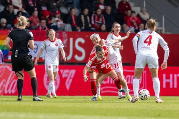 Arianna Caruso 27 FC Bayern Muenchen in duel with Aneta Polaskova 26 1 FC Nuernberg , FC Bayern Frauen Muenchen 1 FC Nuernberg, Google Pixel Frauenbundesliga, 22 Spieltag, 28 03 26 DFB regulations prohibit any use of photographs as image sequences and or quasi video kolbert press Muenchen Bayern Germany Copyright: xkolbert-press UlrichxGamelx