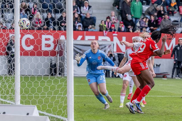 Edna Imade FC Bayern Muenchen Frauen, 29 on her goal for 1 0 against Lourdes Romero Goalkeeper, 1 FC Nuernberg, 25 and her front men GER, FC Bayern Muenchen Frauen vs 1 FC Nuernberg, Football, Google Pixel Frauen Bundesliga, 22 Matchday, Season 2025 2026, 28 03 2026 DFL DFB REGULATIONS PROHIBIT ANY USE OF PHOTOGRAPHS as IMAGE SEQUENCES and or QUASI VIDEO GER, FC Bayern Muenchen Frauen vs 1 FC Nuernberg, Football, Google Pixel Frauen Bundesliga, 22 Spieltag, Saison 2025 2026, 28 03 2026 Muenchen Copyright: xEibner-Pressefoto HeikexFeinerx EP_HFR
