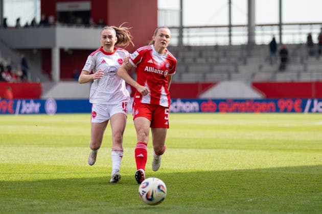 Lara Meroni 11 1 FC Nuernberg in duel with Magdalena Eriksson 5 FC Bayern Muenchen , FC Bayern Frauen Muenchen 1 FC Nuernberg, Google Pixel Frauenbundesliga, 22 Spieltag, 28 03 26 DFB regulations prohibit any use of photographs as image sequences and or quasi video kolbert press Muenchen Bayern Germany Copyright: xkolbert-press UlrichxGamelx