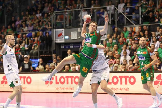28 03 2026, xtgx, Handball, Daikin HBL, SC Magdeburg Füchse Berlin v l Felix Claar Magdeburg, 7 wirft Tor, Torschuetze, erzielt Tor, Treffer, scores the goal Magdeburg