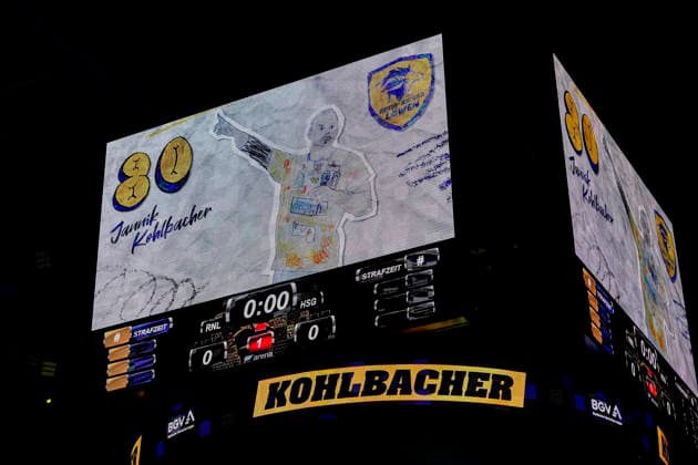 Jannik Kohlbacher RNL, 80 on the scoreboard, video cube, on family match day all player portraits were drawn by children, 28 03 2026, Mannheim Germany , Handball, Bundesliga, Rhein Neckar Löwen HSG Wetzlar xozx