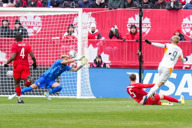 March 28, 2026, Toronto, On, CANADA: Iceland s Orri Steinn Oskarsson shoots past Canada goalkeeper Dayne St. Clair to score his country s second goal during first half International Friendly, Länderspiel, Nationalmannschaft soccer action in Toronto on Saturday March 28, 2026. Orri Steinn Oskarsson; Dayne St. Clair  - ZUMAc35_ 20260328_zaf_c35_018 Copyright: xChrisxYoungx