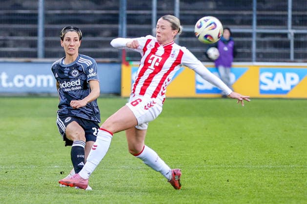 28 03 2026, xsscx, Frauen Fussball, 1 FC Köln Eintracht Frankfurt, 1 Fussball Bundesliga, 22 Spieltag, Franz Kremer Stadion, Saison 2025 2026 Ereleta Memeti Eintracht Frankfurt 27 im Zweikampf gegen Sandra Maria Jessen 1 FC Köln 6 DFB regulations prohibit any use of photographs as image sequences and or quasi video Photo xSandraxScherningxPressefotoKochx Nordrhein Westfalen Germany