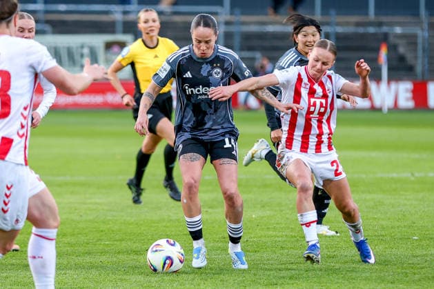 28 03 2026, xsscx, Frauen Fussball, 1 FC Köln Eintracht Frankfurt, 1 Fussball Bundesliga, 22 Spieltag, Franz Kremer Stadion, Saison 2025 2026 Geraldine Reuteler Eintracht Frankfurt 14 im Zweikampf gegen Laura Donhauser 1 FC Köln 25 DFB regulations prohibit any use of photographs as image sequences and or quasi video Photo xSandraxScherningxPressefotoKochx Nordrhein Westfalen Germany