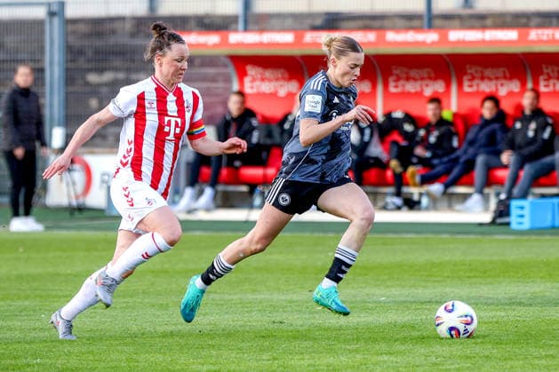 28 03 2026, xsscx, Frauen Fussball, 1 FC Köln Eintracht Frankfurt, 1 Fussball Bundesliga, 22 Spieltag, Franz Kremer Stadion, Saison 2025 2026 Marina Hegering 1 FC Köln 33 im Zweikampf gegen Laura Freigang Eintracht Frankfurt 10 DFB regulations prohibit any use of photographs as image sequences and or quasi video Photo xSandraxScherningxPressefotoKochx Nordrhein Westfalen Germany