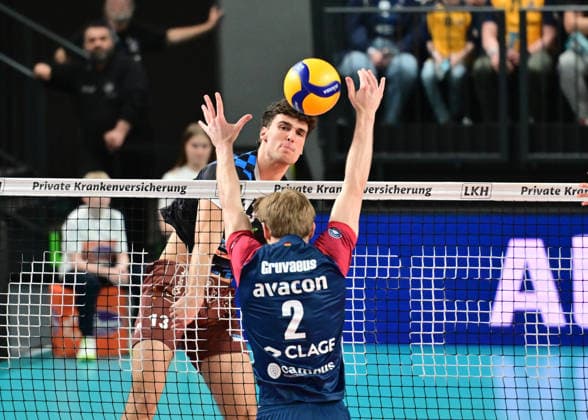 GER 1 VBL, Play Off quarterfinals, SVG Lueneburg vs WWK Volleys Herrsching 28 03 2026, GER 1 VBL, PLay Off quarterfinals, SVG Lueneburg vs WWK Volleys Herrsching, in the picture Niklas Uhl Herrsching 13 tries to assert himself against Daniel Gruvaeus Daniel Gruvaeus SVG 2 nordphotoxGmbH xWitke nph00002