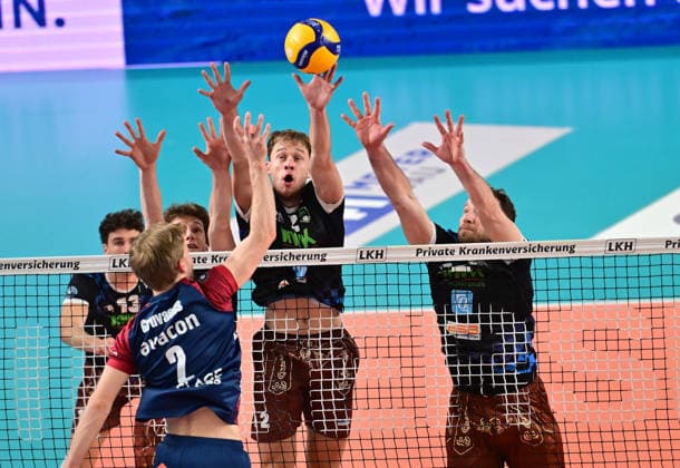 GER 1 VBL, Play Off quarterfinals, SVG Lueneburg vs WWK Volleys Herrsching 28 03 2026, GER 1 VBL, PLay Off quarterfinals, SVG Lueneburg vs WWK Volleys Herrsching, in the picture Daniel Gruvaeus Daniel Gruvaeus SVG 2 tries to prevail against Tobias Hosch Herrsching 11 , Bastian Korreck Herrsching 02 and Denis Kaliberda Herrsching 06 nordphotoxGmbH xWitke nph00002