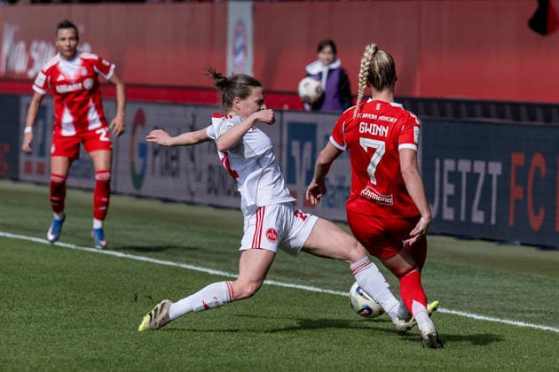 Fight for the ball duel between Nastassja Lein 1 FC Nuernberg, 24 and Giulia Gwinn FC Bayern Muenchen Frauen, 07 GER, FC Bayern Muenchen Frauen vs 1 FC Nuernberg, Fußball, Google Pixel Frauen Bundesliga, 22 Spieltag, Saison 2025 2026, 28 03 2026 DFL DFB REGULATIONS PROHIBIT ANY USE OF PHOTOGRAPHS as IMAGE SEQUENCES and or QUASI VIDEO GER, FC Bayern Muenchen Frauen vs 1 FC Nuernberg, Football, Google Pixel Frauen Bundesliga, 22 Spieltag, Saison 2025 2026, 28 03 2026 Muenchen Copyright: xEibner-Pressefoto HeikexFeinerx EP_HFR