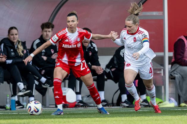 Fight for the ball duel between Arianna Caruso FC Bayern Muenchen Frauen, 27 and Luisa Guttenberger 1 FC Nuernberg, 04 GER, FC Bayern Muenchen Frauen vs 1 FC Nuernberg, Soccer, Google Pixel Women Bundesliga, 22 Matchday, Season 2025 2026, 28 03 2026 DFL DFB REGULATIONS PROHIBIT ANY USE OF PHOTOGRAPHS as IMAGE SEQUENCES and or QUASI VIDEO GER, FC Bayern Muenchen Frauen vs 1 FC Nuernberg, Football, Google Pixel Frauen Bundesliga, 22 Spieltag, Saison 2025 2026, 28 03 2026 Muenchen Copyright: xEibner-Pressefoto HeikexFeinerx EP_HFR