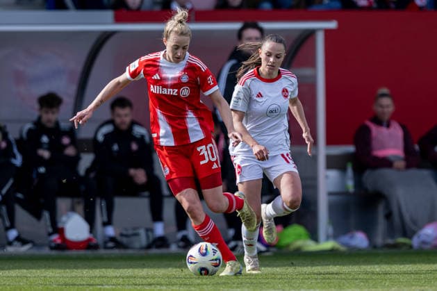 Fight for the ball duel between Carolin Simon FC Bayern Muenchen Frauen, 30 and Sanja Homann 1 FC Nuernberg, 19 GER, FC Bayern Muenchen Frauen vs 1 FC Nuernberg, Soccer, Google Pixel Women Bundesliga, 22 Matchday, Season 2025 2026, 28 03 2026 DFL DFB REGULATIONS PROHIBIT ANY USE OF PHOTOGRAPHS as IMAGE SEQUENCES and or QUASI VIDEO GER, FC Bayern Muenchen Frauen vs 1 FC Nuernberg, Football, Google Pixel Frauen Bundesliga, 22 Spieltag, Saison 2025 2026, 28 03 2026 Muenchen Copyright: xEibner-Pressefoto HeikexFeinerx EP_HFR