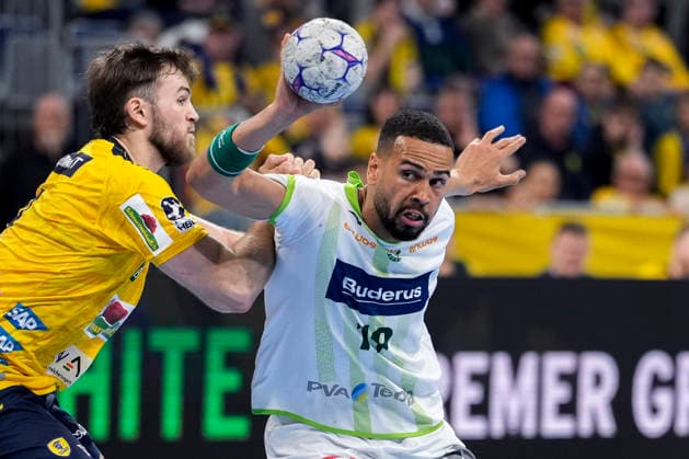 v li Steven Plucnar Jacobsen RNL, 9 , Philipp Ahouansou HSG, 19 , duel, duel, tackle, tackling, dynamics, action, action, 28 03 2026, Mannheim Germany , Handball, Bundesliga, Rhein Neckar Löwen HSG Wetzlar xozx