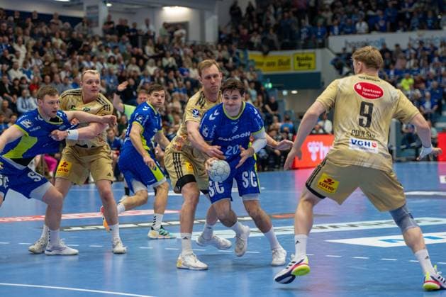 Ludwig Hallbaeck, Back, VfL Gummersbach 20 ,Vilhelm Poulsen, Back, TSV Hannover Burgdorf 9 ,Marian Michalczik, Back, TSV Hannover Burgdorf 22 ,Justus Fischer, Wing, TSV Hannover Burgdorf 54 ,VfL Gummersbach vs TSV Hannover Burgdorf, Daikin Handball Bundesliga, Men , 26 Matchday, 28 03 2026 Gummersbach NRW Germany Copyright: xkolbert-press MartinxWdziecznyx