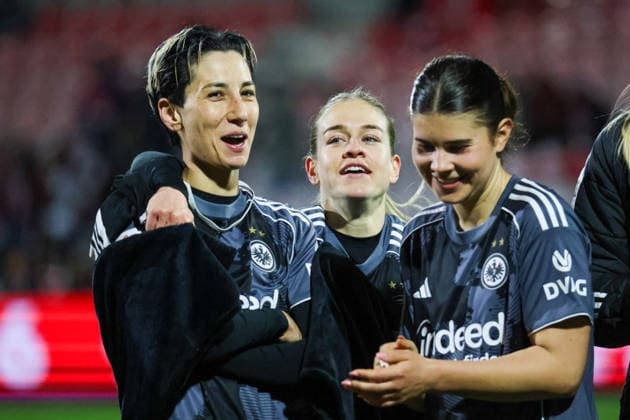 Cologne, Germany 28 March 2026 1 Womens Bundesliga 22 Matchday 1 FC Cologne Women vs Eintracht Frankfurt Women Pictured from left Sara Doorsoun SGE , Nadine Riesen SGE , Noemi Ivelj SGE celebrating after the away win against Cologne Copyright: HMBxMedia MadeleinexFantini