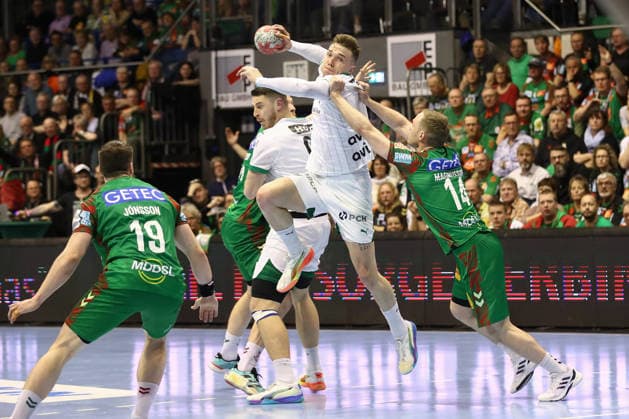 28 03 2026, xtgx, Handball, Daikin HBL, SC Magdeburg Füchse Berlin v l Lasse Andersson Berlin, 11 Omar Ingi Magnusson Magdeburg, 14 duel, duel, fight, tackle Magdeburg