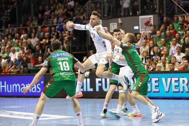 28 03 2026, xtgx, Handball, Daikin HBL, SC Magdeburg Füchse Berlin v l Lasse Andersson Berlin, 11 Omar Ingi Magnusson Magdeburg, 14 duel, duel, fight, tackle Magdeburg