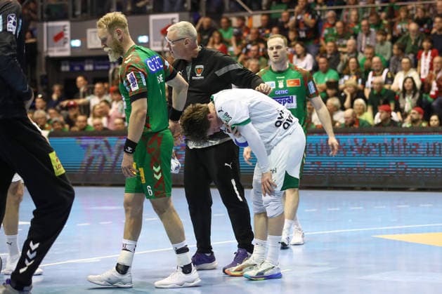 28 03 2026, xtgx, Handball, Daikin HBL, SC Magdeburg Füchse Berlin v l Nils Lichtlein Berlin, 17 injured Injury Magdeburg