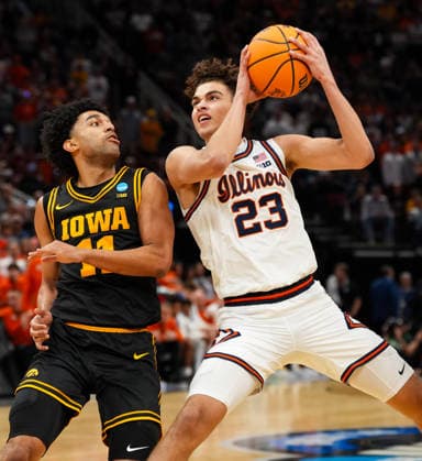 March 28, 2026, Houston, Texas, USA: Illinois guard KEATON WAGLER (23) moves the ball against Iowa guard KAEL COMBS (11) during the NCAA, College League, USA MenÃ¢â‚¬â ¢s Basketball Tournament Elite Eight game between the Illinois Fighting Illini and the Iowa Hawkeyes on March 28, 2026 in Houston, Texas. Illinois won, 71-59. Houston USA - ZUMAc201 20260328_zap_c201_006 Copyright: xScottxColemanx