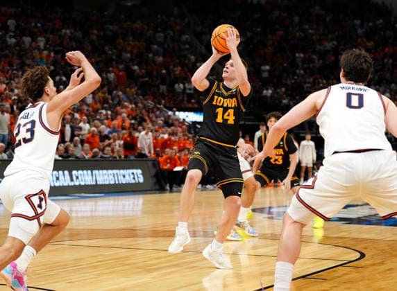 March 28, 2026, Houston, Texas, USA: Iowa guard BENNETT STIRTZ (14) shoots the ball during the NCAA, College League, USA MenÃ¢â‚¬â ¢s Basketball Tournament Elite Eight game between the Illinois Fighting Illini and the Iowa Hawkeyes on March 28, 2026 in Houston, Texas. Illinois won, 71-59. NCAA Basketball 2026: Illinois 71:59 Iowa  - ZUMAc201 20260328_zap_c201_035 Copyright: xScottxColemanx
