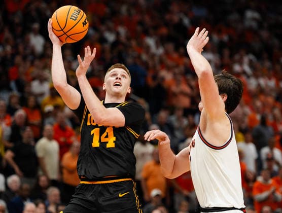 March 28, 2026, Houston, Texas, USA: Iowa guard BENNETT STIRTZ (14) shoots the ball during the NCAA, College League, USA MenÃ¢â‚¬â ¢s Basketball Tournament Elite Eight game between the Illinois Fighting Illini and the Iowa Hawkeyes on March 28, 2026 in Houston, Texas. Illinois won, 71-59. NCAA Basketball 2026: Illinois 71:59 Iowa  - ZUMAc201 20260328_zap_c201_038 Copyright: xScottxColemanx