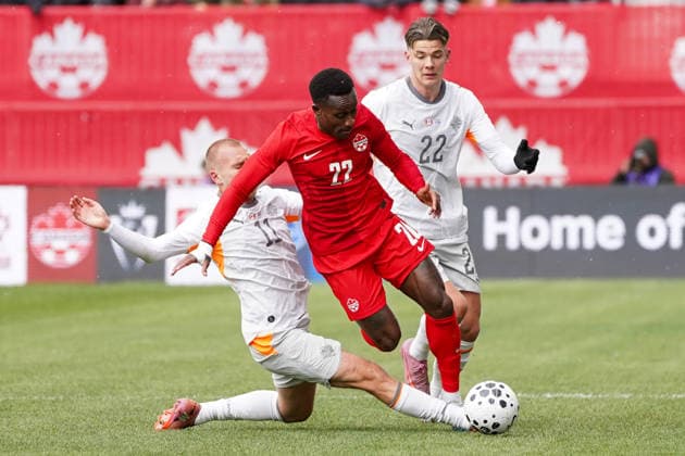 March 28, 2026, Toronto, Ontario, Canada: Richie Laryea 22 of Canada and Jon Dagur Thorsteinsson 11 of Iceland Brynjolfur Wilumsson 22 of Iceland battle for the ball during the International Friendly, Länderspiel, Nationalmannschaft match between Canada and Iceland at BMO Filed. on March 28, 2026 in Toronto, Ontario. Toronto Canada - ZUMAe321 20260328_zsa_e321_033 Copyright: xLeonardoxRamirezx