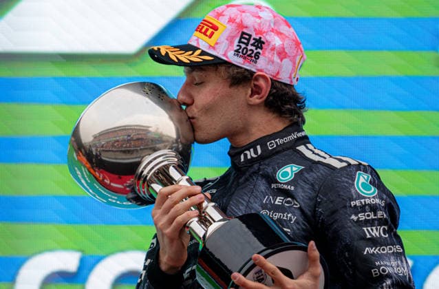 29th March 2026; Suzuka Circuit, Suzuka, Japan; 2026 FIA Formula 1 Japanese Grand Prix Race Day; Kimi Antonelli (12) of Italy and Mercedes-AMG PETRONAS Formula One Team kissing the champions trophy after winning the Japanese Grand Prix 2026 KeiichixMiyashita Content restricted for UK based newspaper