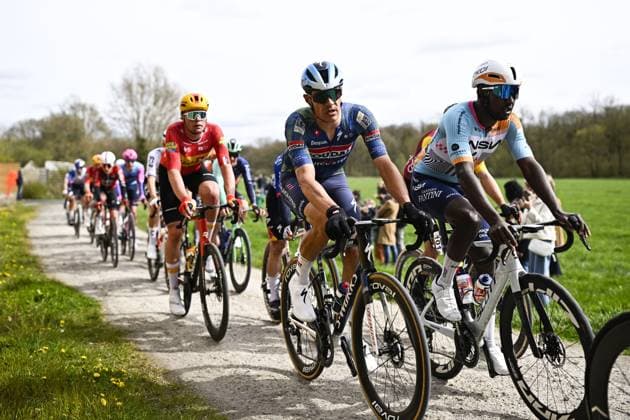 Belgian Jasper Stuyven of Soudal Quick-Step and Eritrean Biniam Girmay of NSN Cycling Team pictured in action on Plugstreets during the men elite Middelkerke-Wevelgem - In Flanders Fields one day cycling race, 240.8 km from Middelkerke to Wevelgem, on Sunday 29 March 2026. JASPERxJACOBS  x169247623x