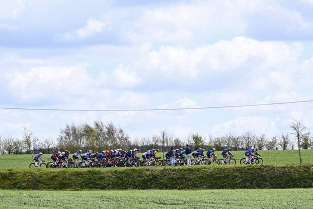The pack of riders pictured in action during the men elite Middelkerke-Wevelgem - In Flanders Fields one day cycling race, 240.8 km from Middelkerke to Wevelgem, on Sunday 29 March 2026. JASPERxJACOBS  x169248447x