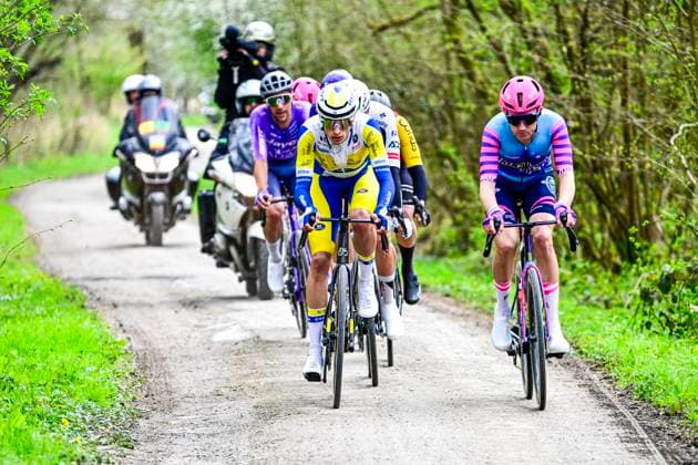 In Flanders Fields From Middelkerke to Wevelgem 2026 Cycling Race WEVELGEM, BELGIUM - MARCH 29 : Rider of Team Unibet Rose Rockets leading the peloton, Rider of Team Flanders - Baloise during the 88th edition of In Flanders Fields From Middelkerke to Wevelgem an UCI World Tour 1.UWT one day cycling road race for Men Elite of 240 km with start in Middelkerke and finish in Wevelgem on March 29, 2026 in Wevelgem, Belgium, 29 03 2026 ( Motordriver Guy De Vuyst - Wevelgem Belgium  Copyright: xJanxDexMeuleneirx