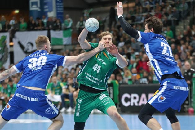 Handball DAIKIN HBL, SC DHfK Leipzig ThSV Eisenach 29 03 2026 Blaer Hinriksson 44, SC DHfK Leipzig is attacked by Dominik Solak 30, ThSV Eisenach Handball, DAIKIN HBL, 1 Bundesliga, Season 2025 2026, Matchday 26 SC DHfK Leipzig vs ThSV Eisenach on 29 03 2026 at Quarterback Immobilien Arena Leipzig Copyright: xBEAUTIFULxSPORTS JanxKaeferx