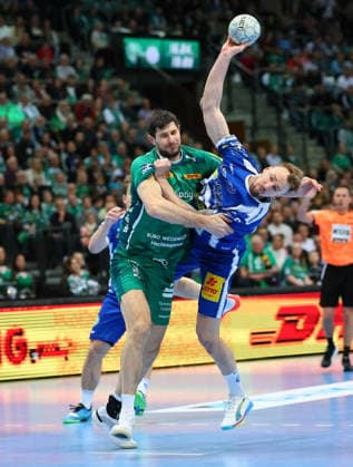 Leipzig, 29 03 2026, QUARTERBACK ARENA, Matchday 26, Handball Bundesliga , SC DHFK Leipzig vs ThSV Eisenach , In the picture from l Marko Mamic 14, Leipzig and Dominik Solak 30, Eisenach , Picture Point