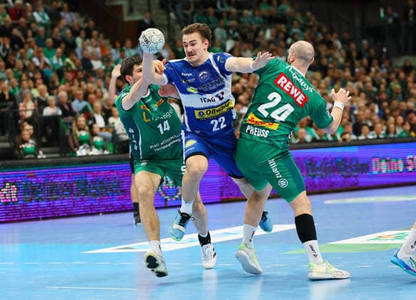 Leipzig, 29 03 2026, QUARTERBACK ARENA, Matchday 26, Handball Bundesliga , SC DHFK Leipzig vs ThSV Eisenach , In the picture from l Marko Mamic 14, Leipzig , Felix Aellen 22, Eisenach and Moritz Preuss 24, Leipzig , Picture Point