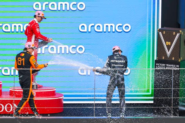 March 29, 2026, Suzuka, Mie, Japan: CHARLES LECLERC of Ferrari and OSCAR PIASTRI of McLaren spray champagne on KIMI ANTONELLI of Mercedes on the podium after the Formula 1 Japanese Grand Prix at Suzuka Circuit. Suzuka Japan - ZUMAh201 20260329_zsp_h201_041 Copyright: xYichinxHoux
