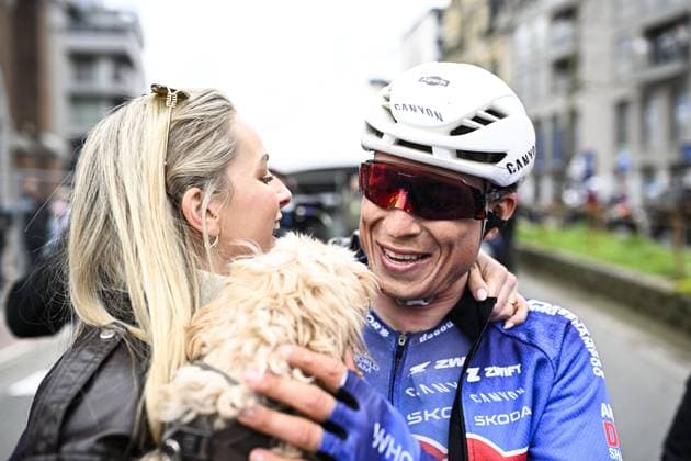 Belgian Jasper Philipsen and his partner Melanie Peetermans celebrate after winning the men elite Middelkerke-Wevelgem - In Flanders Fields one day cycling race, 240.8 km from Middelkerke to Wevelgem, on Sunday 29 March 2026. JASPERxJACOBS  x169253423x