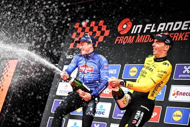 Belgian Jasper Philipsen of Alpecin-Premier Tech celebrates on the podium after winning the men elite Middelkerke-Wevelgem - In Flanders Fields one day cycling race, 240.8 km from Middelkerke to Wevelgem, on Sunday 29 March 2026. JASPERxJACOBS  x169253688x