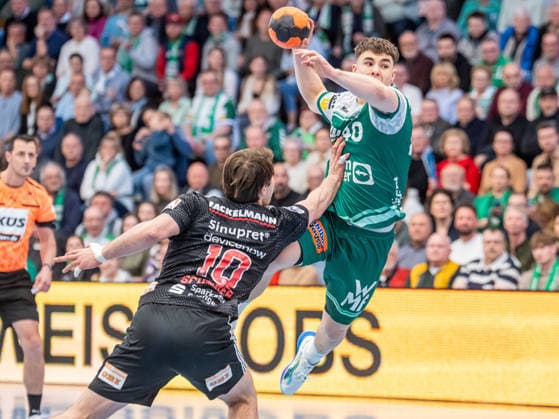 Elias Newel Frisch Auf Goeppingen, 40 in duel with Florian Scheerer HC Erlangen, 10 , Frisch Auf Goeppingen vs HC Erlangen, Handball, 1 Bundesliga, Men, Season 2025 2026, 29 03 2026, Frisch Auf Goeppingen vs HC Erlangen, Handball, 1 Bundesliga, Men, Season 2025 2026, 29 03 2026 Goeppingen Copyright: xEibner-Pressefoto MichaelxSchmidx EP_MST