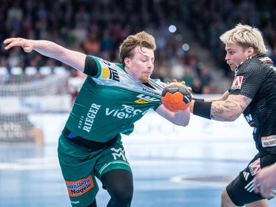 Erik Persson Frisch Auf Goeppingen, 22 in duel with Marek Nissen HC Erlangen, 06 , Frisch Auf Goeppingen vs HC Erlangen, Handball, 1 Bundesliga, Men, Season 2025 2026, 29 03 2026, Frisch Auf Goeppingen vs HC Erlangen, Handball, 1 Bundesliga, Men, Season 2025 2026, 29 03 2026 Goeppingen Copyright: xEibner-Pressefoto MichaelxSchmidx EP_MST