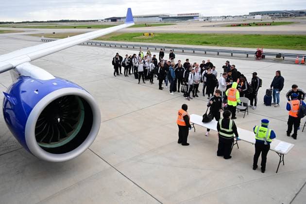 Belgium s players and staff members pictured during a security check on the tarmac of Atlanta airport as Red Devils, the Belgian national soccer team, are traveling to Chicago, USA, for a second friendly game, on Sunday 29 March 2026. These games are preparation games of the 2026 World Cup. DIRKxWAEM  x169259478x