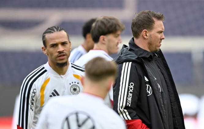 Leroy Sane GER 19 behind national coach Coach Julian Nagelsmann GER warm-up training iam 29 03 2026 m ahead of DFB Laenderspiel Germany GER vs Ghana GHA Freundschatsspiel Testspiel am 30 03 2026 DFL REGULATIONS PROHIBIT ANY USE OF PHOTOGRAPHS AS IMAGE SEQUENCES AND OR QUASI VIDEO DFB Laenderspiel Germany GER vs Ghana GHA