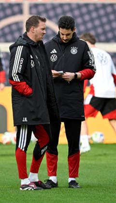 German national coach Coach Julian Nagelsmann GER in conversation Discussion with co-coach Coach Benjamin Glueck GER Zettelö thoughtfully warming up Training iam 29 03 2026 m ahead of the DFB Laenderspiel Germany GER vs Ghana GHA Freundschatsspiel Testspiel am 30 03 2026 DFL REGULATIONS PROHIBIT ANY USE OF PHOTOGRAPHS AS IMAGE SEQUENCES AND OR QUASI VIDEO DFB Laenderspiel Germany GER vs Ghana GHA