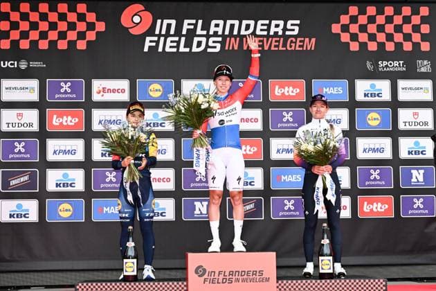 Belgian Fleur Moors of Lidl-Trek, Dutch Lorena Wiebes of SD Worx-Protime and Dutch Karlijn Swinkels of UAE Team ADQ pictured on the podium after the women elite Wevelgem to Wevelgem - In Flanders Fields one day cycling race, 134.9 km from and to Wevelgem, on Sunday 29 March 2026. MAARTENxSTRAETEMANS  x169261254x