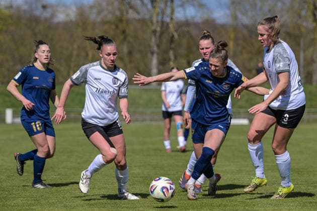 29 03 2026, Football, 2 Womens Bundesliga, 2025 2026, Matchday 21, SG 99 Andernach SV Meppen Lana Hubbeling 18 Meppen and Nina Rolfes 3 Meppen tackle Carolin Schraa SG 99 Andernach Andernach Stadion Rheinland Pfalz Germany