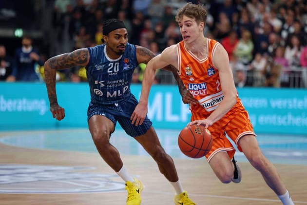 from left in duel, Michael Weathers MLP Academics Heidelberg, 20 , Tobias Jensen Ratiopharm Ulm, 7 GER, MLP Academics Heidelberg vs Ratiopharm Ulm, Basketball, easycredit Basketball Bundesliga, 26 Matchday, Season, 2025 2026, 29 03 2025 GER, MLP Academics Heidelberg vs Ratiopharm Ulm, Basketball, easycredit Basketball Bundesliga, 26 Matchday, Season, 2025 2026, 29 03 2025 Heidelberg Copyright: xEibner-Pressefoto JoergxHirschx EP_JHH