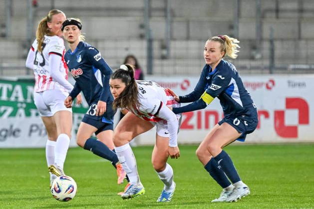 Svenja Foelmli SC Freiburg, 09 on the ball and in a duel with Vanessa Diehm TSG Hoffenheim, 06 GER, SC Freiburg TSG Hoffenheim, Womens Soccer, Google Pixel Womens Bundesliga, 22 Matchday, Season 2025 2026, 29 03 2026 DFB REGULATES PROHIBIT ANY USE OF PHOTOGRAPHS AS IMAGE SEQUENCES AND OR QUASI VIDEO GER, SC Freiburg TSG Hoffenheim, Womens football, Google Pixel Womens Bundesliga, 22 Matchday, Season 2025 2026, 29 03 2026 Freiburg Copyright: xEibner-Pressefoto ThomasxHessx EP_THS