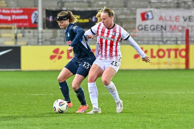 Wielle Douma TSG Hoffenheim, 13 , Luca Birkholz SC Freiburg, 23 in duel duel for the ball GER, SC Freiburg TSG Hoffenheim, Womens Football, Google Pixel Womens Bundesliga, 22 Matchday, Season 2025 2026, 29 03 2026 DFB REGULATES PROHIBIT ANY USE OF PHOTOGRAPHS AS IMAGE SEQUENCES AND OR QUASI VIDEO GER, SC Freiburg TSG Hoffenheim, Womens football, Google Pixel Womens Bundesliga, 22 Matchday, Season 2025 2026, 29 03 2026 Freiburg Copyright: xEibner-Pressefoto ThomasxHessx EP_THS