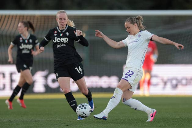 Biella, Italy, 29th March 2026. Amalie Jorgensen Vangsgaard of Juventus closes in as Ilse Van Der Zanden of AFC Fiorentina passes the ball during the Juventus Women vs Fiorentina Women Coppa Italia Femminile Semi Final 2nd leg match at Stadio Vittorio Pozzo, Biella. Picture credit should read: Jonathan Moscrop Sportimage EDITORIAL USE ONLY. No use with unauthorised audio, video, data, fixture lists, club league logos or live services. Online in-match use limited to 120 images, no video emulation. No use in betting, games or single club league player publications. SPI_026_JM_JUVE_FIORENTINA_FEMM_CI SPI-4623-0026