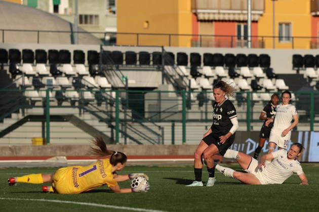 Biella, Italy, 29th March 2026. Cecilie Fiskerstrand of AFC Fiorentina saves the ball to deny Ana Capeta of Juventus a goal during the Juventus Women vs Fiorentina Women Coppa Italia Femminile Semi Final 2nd leg match at Stadio Vittorio Pozzo, Biella. Picture credit should read: Jonathan Moscrop Sportimage EDITORIAL USE ONLY. No use with unauthorised audio, video, data, fixture lists, club league logos or live services. Online in-match use limited to 120 images, no video emulation. No use in betting, games or single club league player publications. SPI_033_JM_JUVE_FIORENTINA_FEMM_CI SPI-4623-0033