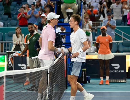 MIAMI GARDENS, FL - MARCH 29: Jannik Sinner of Italy, left, shakes the hand of Jiri Lehecka of the Czech Republic after winning the menÕs singles final of the Miami Open on March 29, 2026, at Hard Rock Stadium in Miami Gardens, Florida. (Photo by Michele Eve Sandberg Icon Sportswire) TENNIS: MAR 29 Miami Open EDITORIAL USE ONLY Icon2603290916