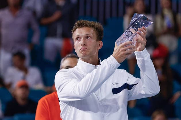 MIAMI GARDENS, FL - MARCH 29: Jiri Leheca (CZE) poses with the Butch Buchholz men™s singles runners up trophy at the Miami Open on March 29, 2026, at Hard Rock Stadium in Miami Gardens, Florida,(Photo by Chris Arjoon Icon Sportswire) TENNIS: MAR 29 Miami Open EDITORIAL USE ONLY Icon2603290010089